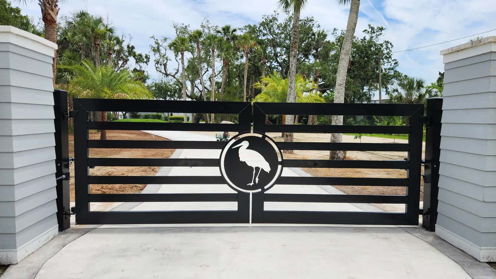 Florida Custom Estate Driveway Gate With Custom Heron Emblem Logo